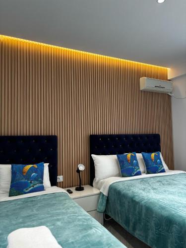 Katil atau katil-katil dalam bilik di Hotel Bella Vista
