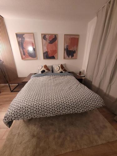 En eller flere senge i et værelse på Appart avec jardin proche mer