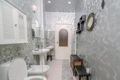 a bathroom with a sink and a toilet in it at Top Center, 3BDR, Heart of the city, FREE Secured Parking in Sofia