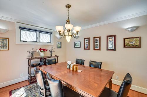 a dining room with a table and chairs at 6 Blocks to SJSU Cozy Bungalow with Deck and Koi Pond in San Jose
