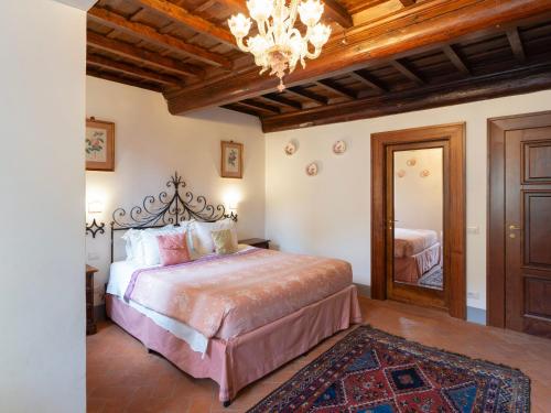 Postel nebo postele na pokoji v ubytování Borgia di Firenze