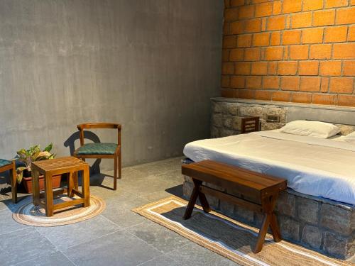 Cama o camas de una habitación en Rustic Nestle, Tirupur