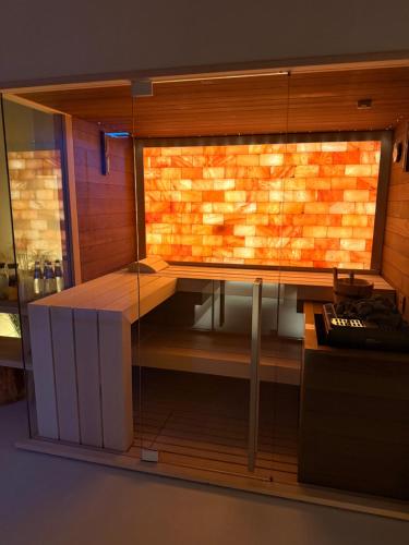 a model of a kitchen with a brick wall at Hotel Regina Margherita in Cagliari