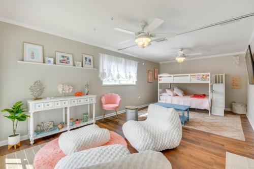 a living room with a couch and a bed at 2 Mi to Shore Modern Retreat in Fort Walton Beach in Fort Walton Beach