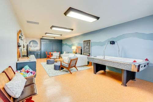 a room with a pool table on the wall at Lakefront Home with Private Dock in Grove in Grove