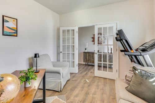 a living room with a couch and a table at 9 Mi to Old Salem Spacious Family Home with Yard! in Winston-Salem