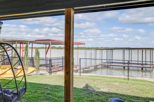 a view of a large body of water with a pier at Lakefront Home with Dock and Patio in San Angelo! in San Angelo