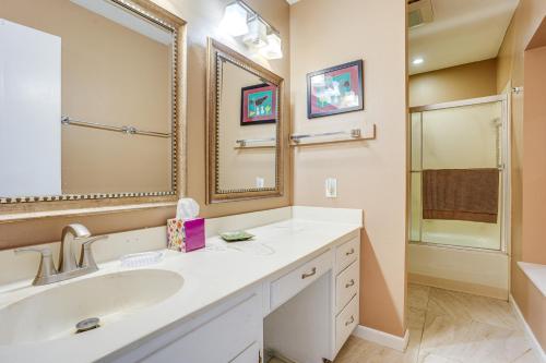 a bathroom with a sink and a mirror at Golf Course Views Prescott Home with Patios in Prescott Valley