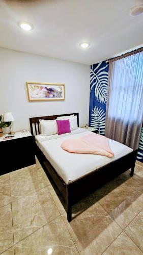 Cama o camas de una habitación en Somos Hotel San Juan