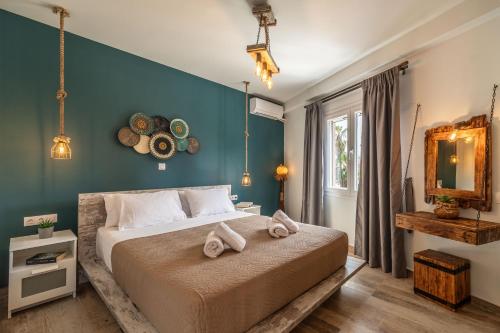 Postel nebo postele na pokoji v ubytování Semiso Beach Suites