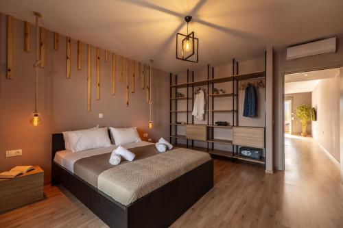 Ένα ή περισσότερα κρεβάτια σε δωμάτιο στο Semiso Beach Suites