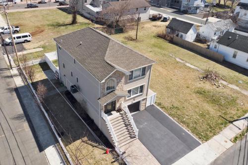 an overhead view of a house with a yard at The Seabreeze Haven in Keansburg
