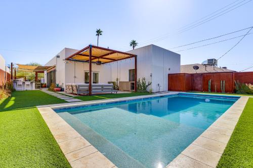 a swimming pool in the backyard of a house at Backyard Oasis with Pool! Family Getaway in Phoenix in Phoenix