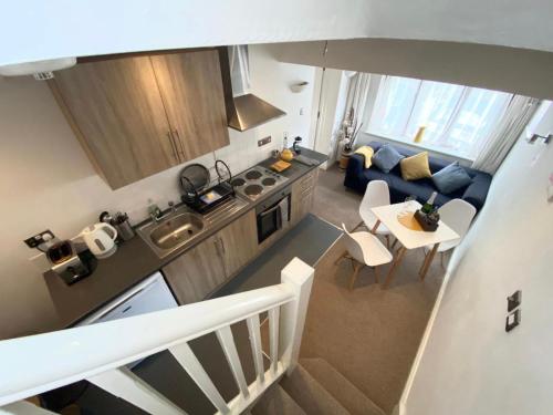 an overhead view of a kitchen and a living room at The Hanham Retreat in Bristol
