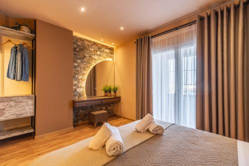 Ένα ή περισσότερα κρεβάτια σε δωμάτιο στο Semiso Beach Suites