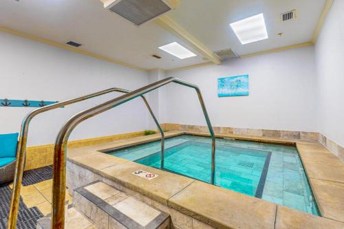 a indoor swimming pool in a building at Plantation Dunes #5404 in Gulf Highlands