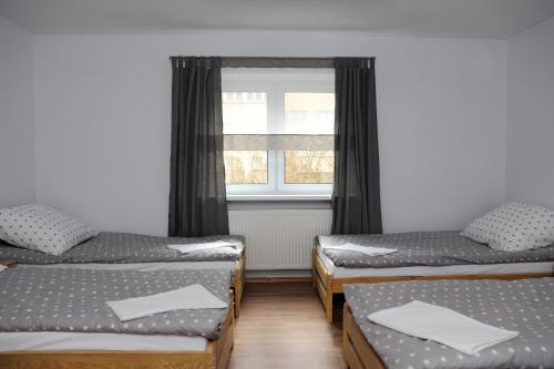 Gulta vai gultas numurā naktsmītnē Hostel Grono