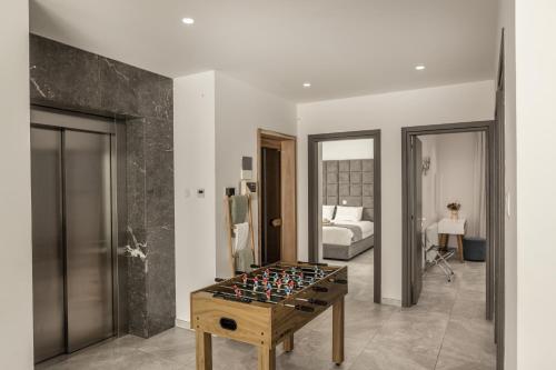 a room with a chess board on a table at Fig Tree Bay Residences 7 in Protaras