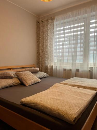 Postel nebo postele na pokoji v ubytování Noclegi u Eweliny
