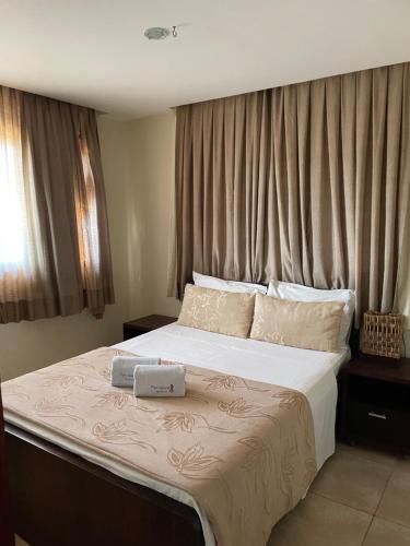 En eller flere senge i et værelse på Pipa Beleza Praia do Amor