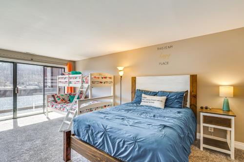 a bedroom with a bunk bed and a ladder at Boat Slip and Pools Lakefront Osage Beach Condo in Osage Beach