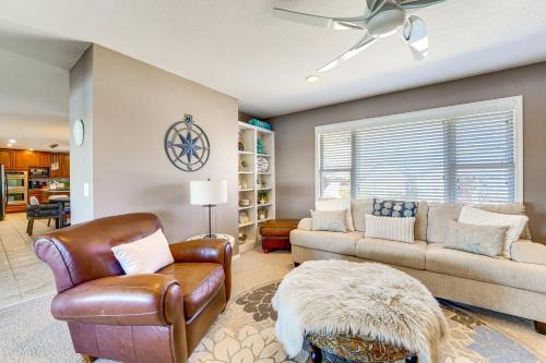 a living room with a couch and a chair at The Best Views on Beaver Lake! Home with Deck and BBQ in Rogers