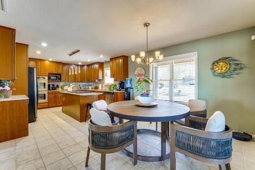 a kitchen with a table and chairs in a room at The Best Views on Beaver Lake! Home with Deck and BBQ in Rogers