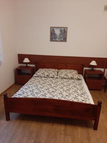 Ένα ή περισσότερα κρεβάτια σε δωμάτιο στο Apartamenty i Pokoje Willa Dafne
