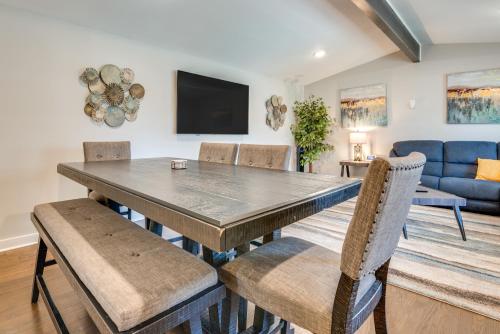 a dining room with a table and chairs at 11 Mi to Dtwn Atlanta Conley Home with Yard in Conley