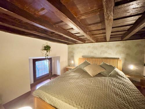 Giường trong phòng chung tại Trastevere Loft garden