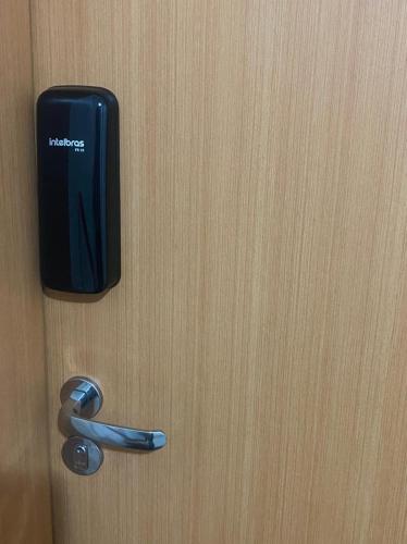 a door with ajar door knob and ajar door at Apartamento Confortável próximo Aeroporto e Arena do Grêmio in Porto Alegre