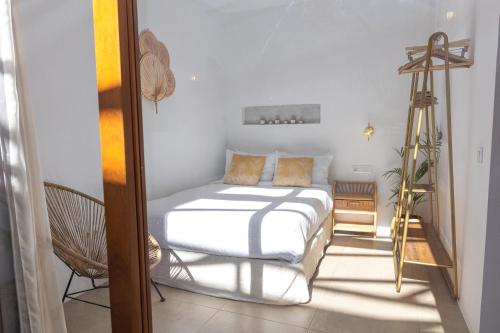 Ένα ή περισσότερα κρεβάτια σε δωμάτιο στο Charming house with Rooftop Pool