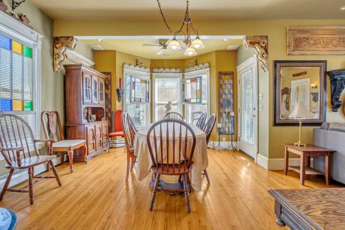 a dining room with a table and chairs at A Bonnie Place in Oneonta