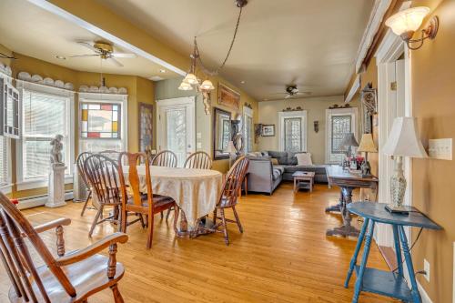 a dining room and living room with a table and chairs at A Bonnie Place in Oneonta