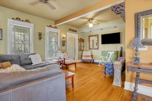 a living room with a couch and a tv at A Bonnie Place in Oneonta