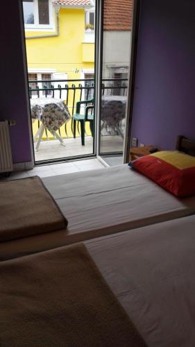 Ένα ή περισσότερα κρεβάτια σε δωμάτιο στο Guesthouse Ivan