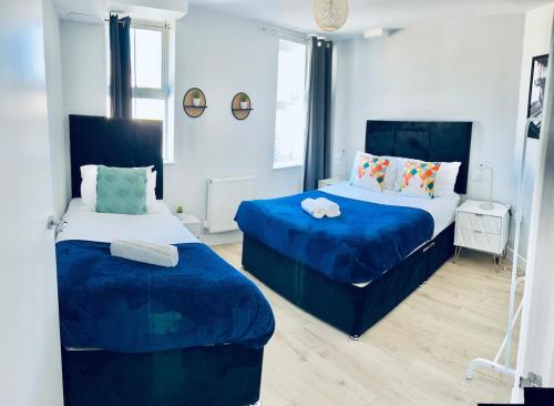 Ένα ή περισσότερα κρεβάτια σε δωμάτιο στο Lux 2BR Flat Folkestone Habour F3