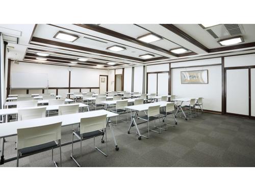 a large room with tables and chairs in it at Smile Hotel koriyama - Vacation STAY 61221v in Koriyama