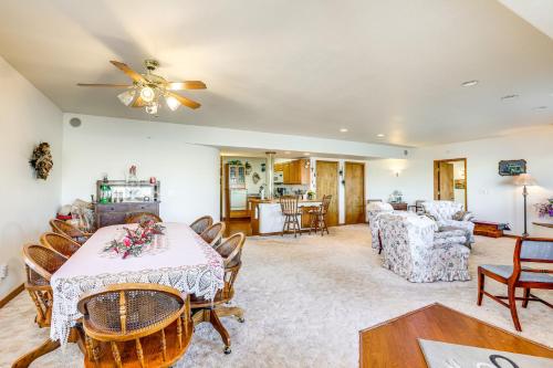a living room with a table and chairs at 7 Mi to Dtwn Denver Lakefront Gem with Dock! in Denver