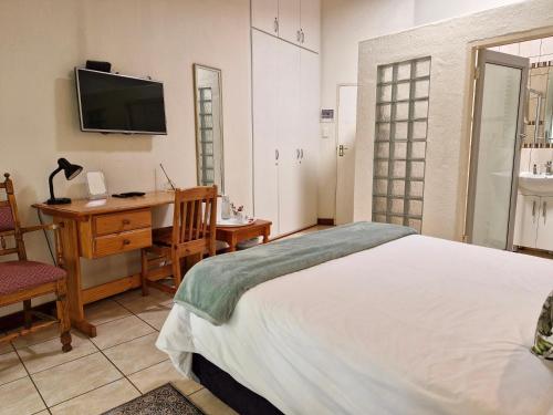 Postel nebo postele na pokoji v ubytování Villa Sardinia Guest House