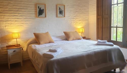 Ένα ή περισσότερα κρεβάτια σε δωμάτιο στο Espectacular Casa de Campo en Areco