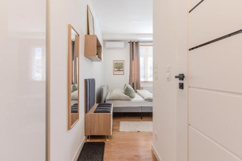 Ένα ή περισσότερα κρεβάτια σε δωμάτιο στο MW 3A Apartamenty