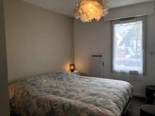 Postel nebo postele na pokoji v ubytování Résidence La Lorena - LA BAULE COEUR DE VILLE MAE-2491