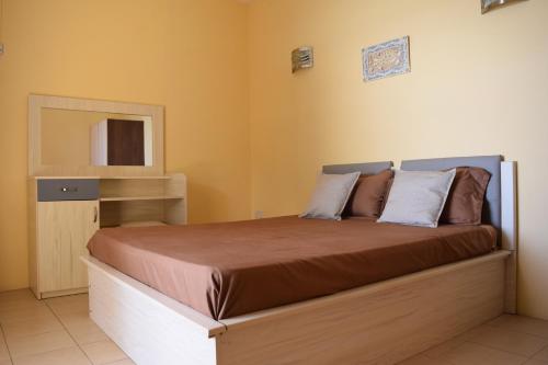 Postel nebo postele na pokoji v ubytování Baywatch Apartment