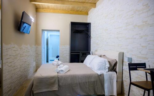TV a/nebo společenská místnost v ubytování Criba Rooms