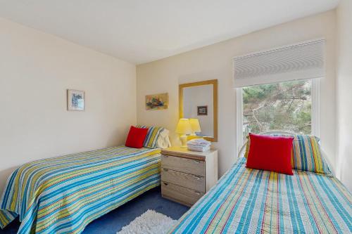 Ένα ή περισσότερα κρεβάτια σε δωμάτιο στο Sea Colony --- 3401 Round Robin Way