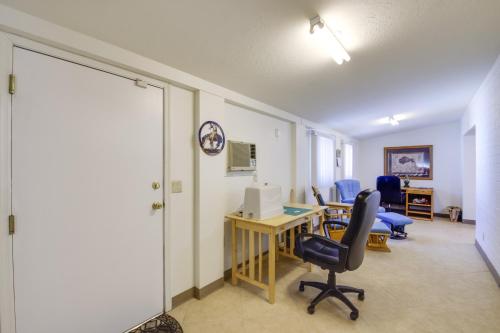 an office with a desk and chairs in a room at Patio and Mtn Views 55 and Apache Junction Home! in Apache Junction