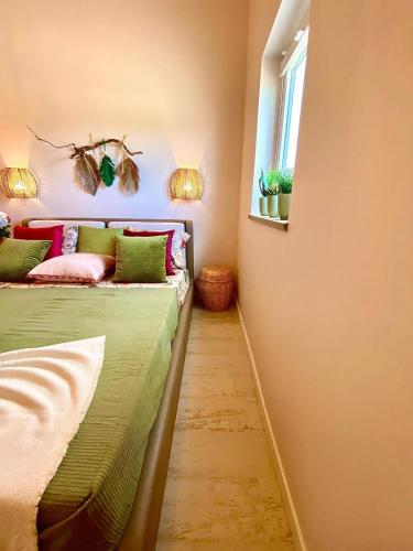 a room with two beds and a window at Portugals Infinity Eco Suite Resort in Tavira