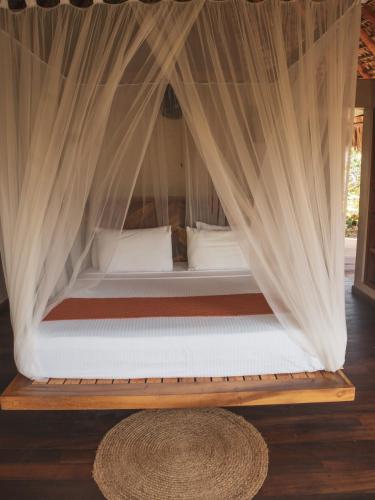 Ein Bett oder Betten in einem Zimmer der Unterkunft Aldea Mizúl