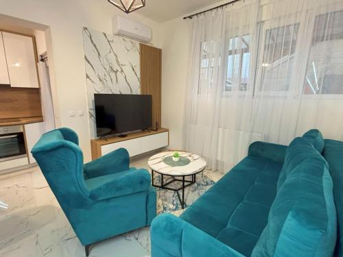 TV a/nebo společenská místnost v ubytování Ilidza Apartments - PEJTON RESIDENCE - Free Parking